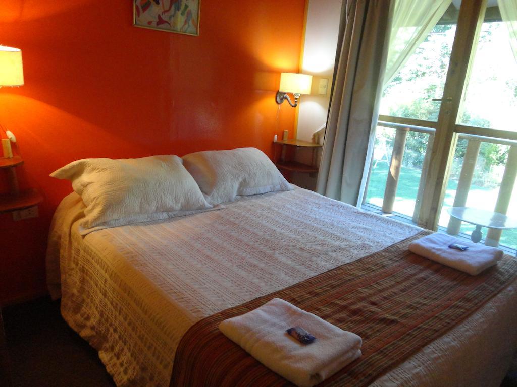 Cabañas Spa Bungalows Huarranchi Pucón Habitación foto